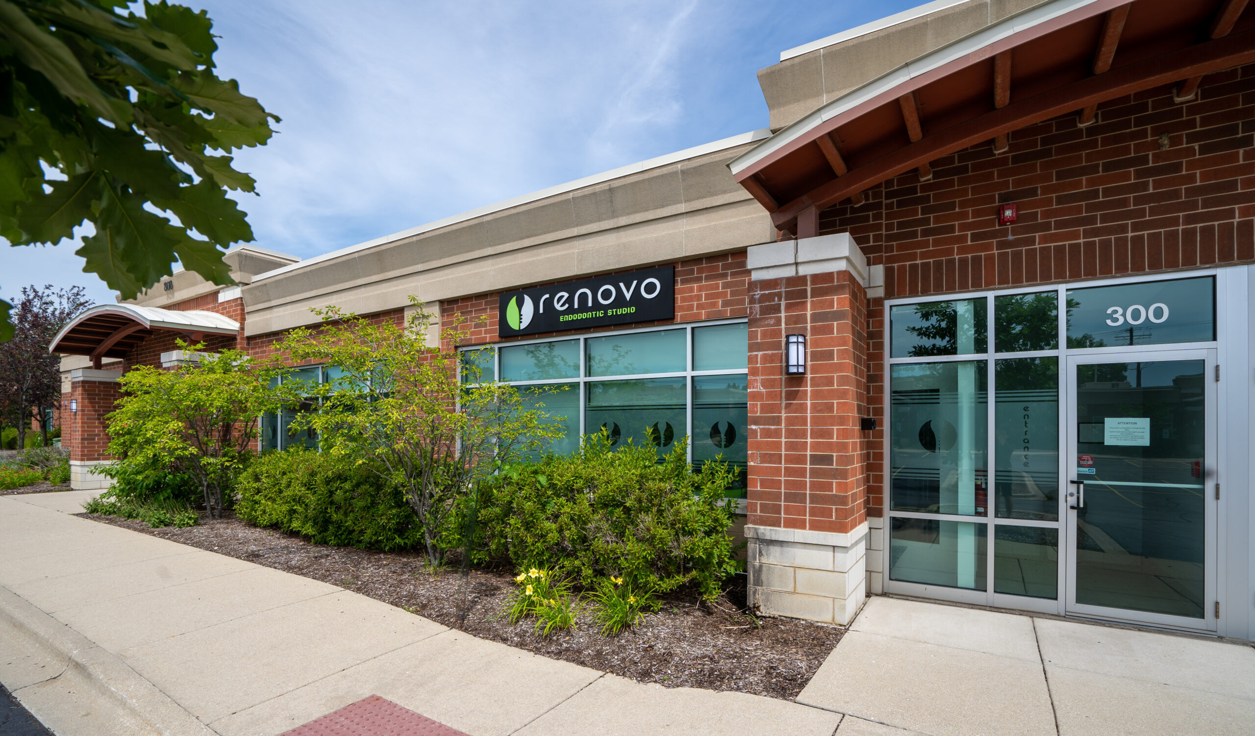 A brick building with Renovo signage.