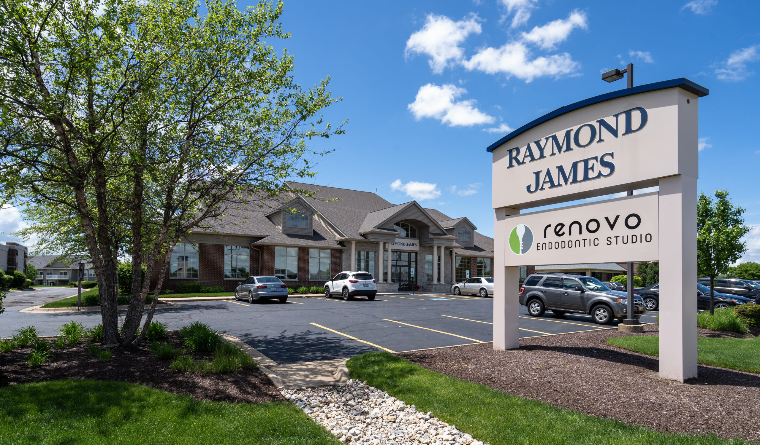 A white building showing the Rockford, IL location