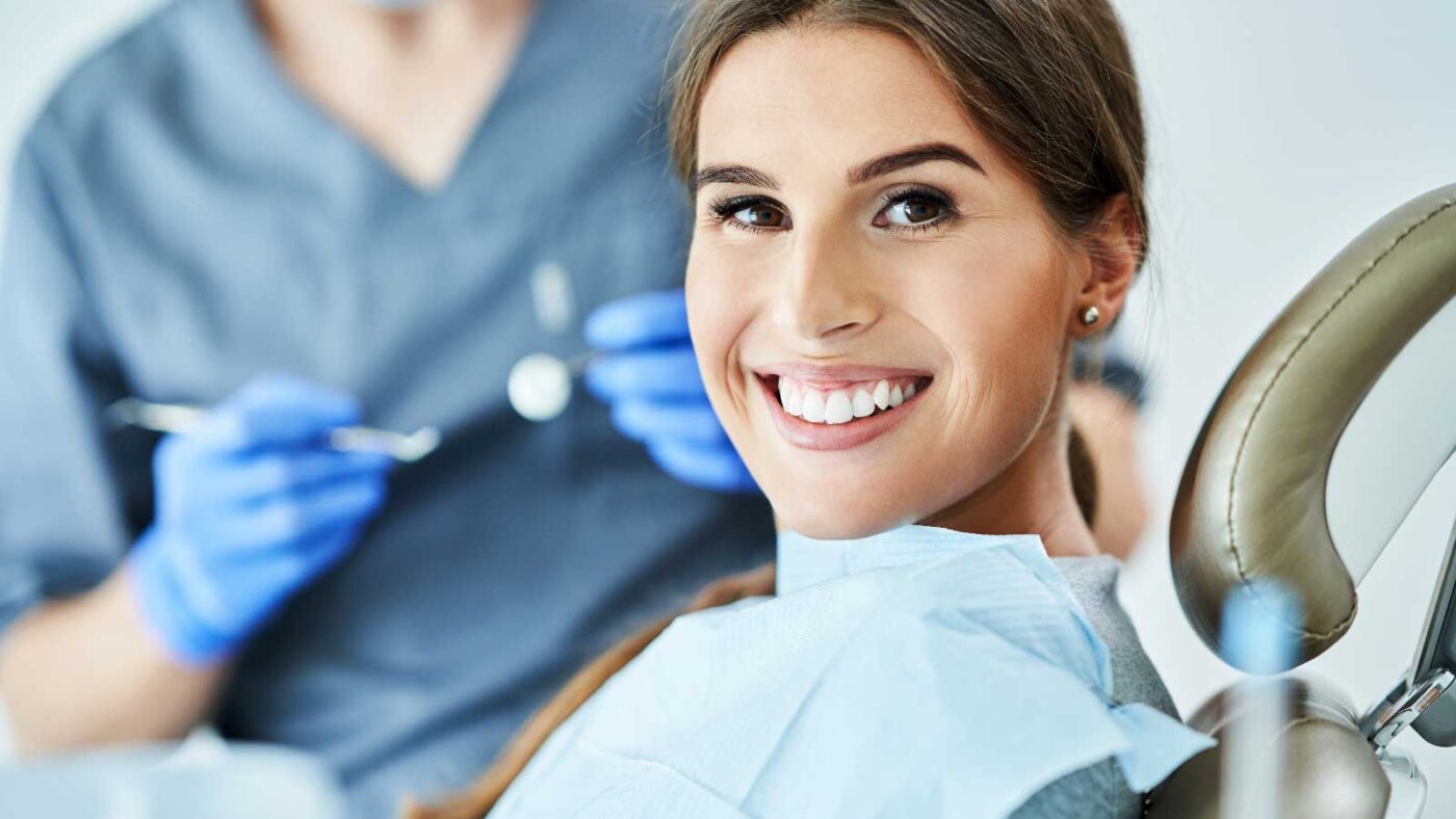 A happy patient smiling during a dental check-up