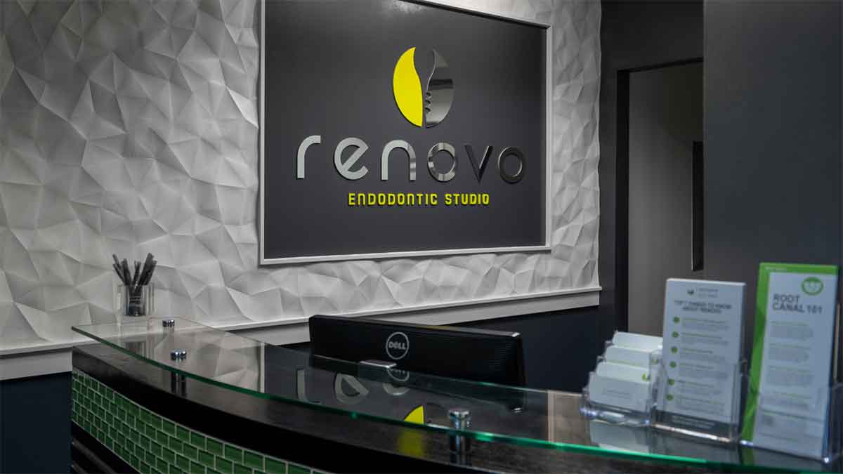 Reception desk at Renovo Endodontic Studio with modern decor