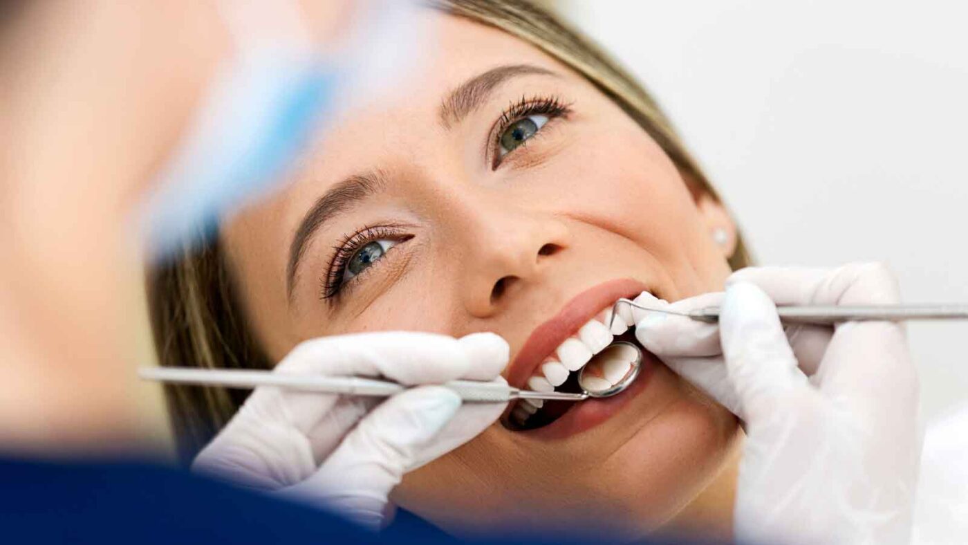 Woman getting a dental checkup