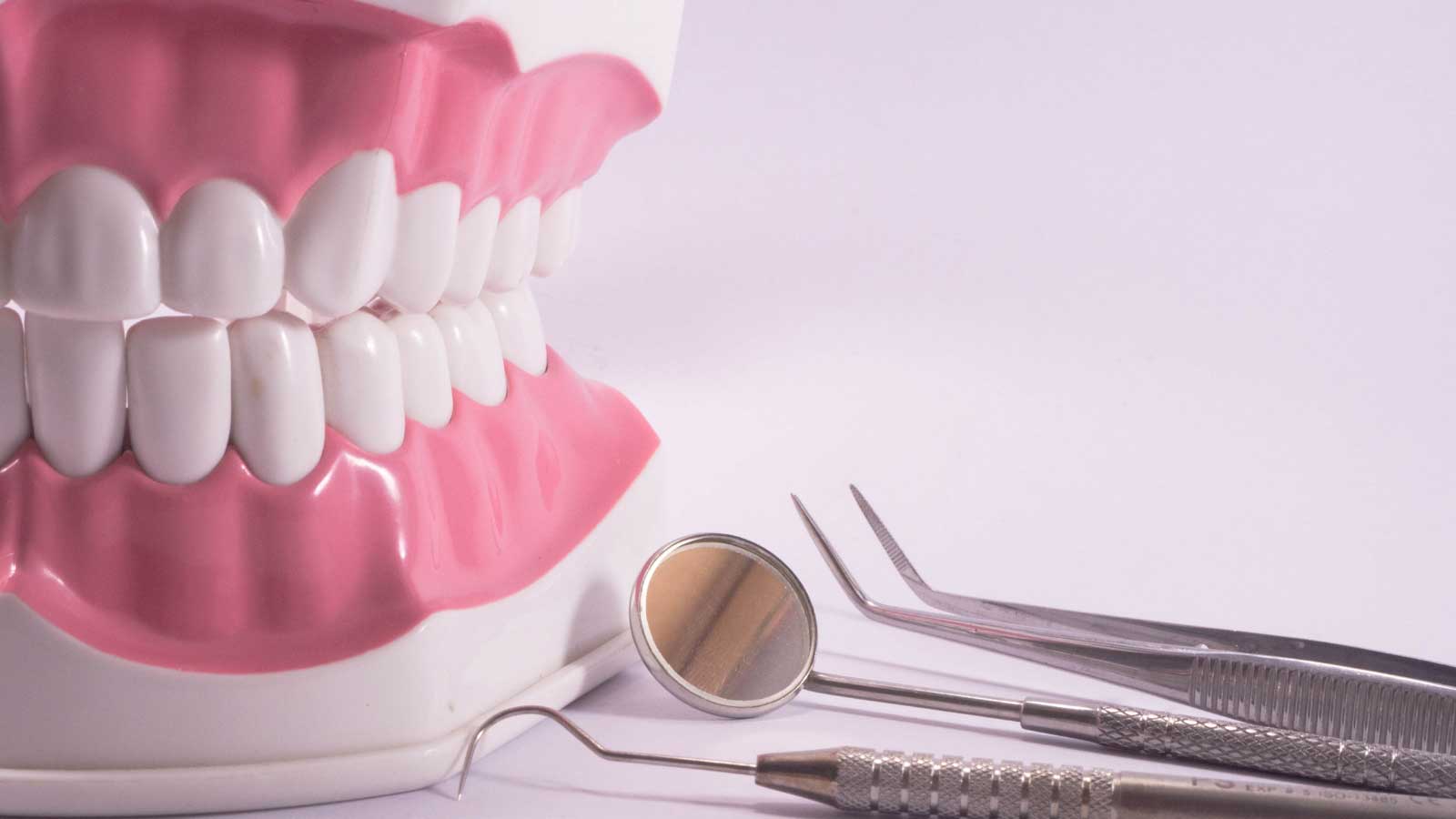 Dental-model-with-tools-used-for-oral-health-examination