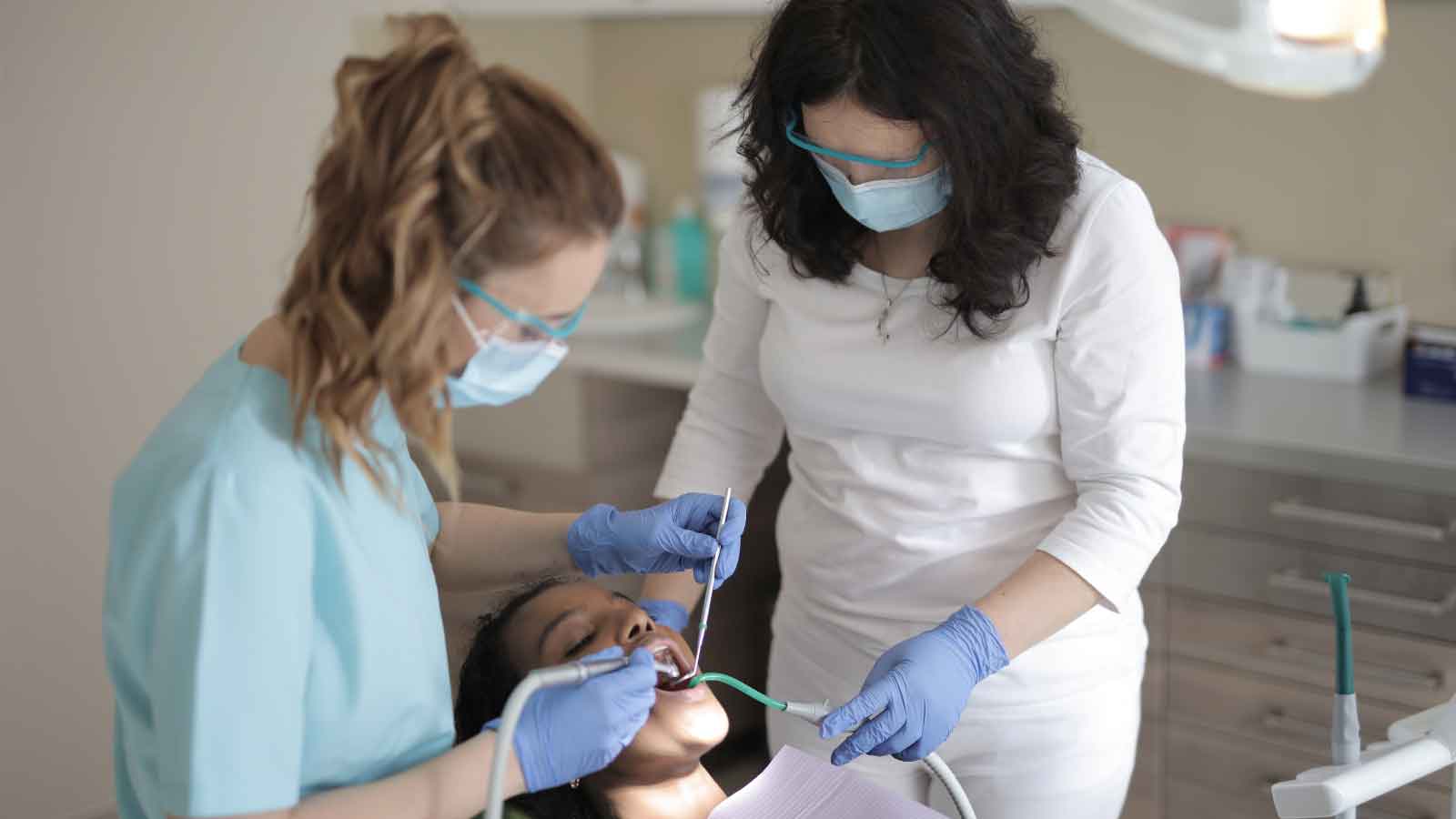 Dental-team-treating-a-patient